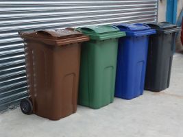 all wheelie bins in a row